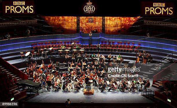 Musicians of The West-Eastern Divan youth orchestra, conducted by Daniel Barenboim rehearse in the Royal Albert Hall ahead of their performace in the...