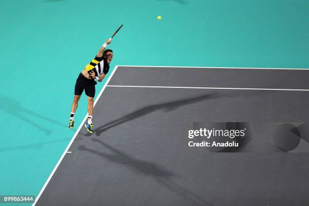 Roberto Bautista Agut of Spain in action during his final match against Kevin Anderson of South Africa on day three of the Mubadala World Tennis...