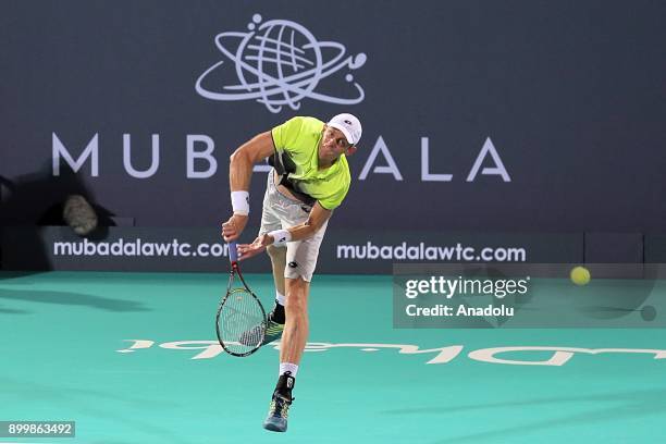 Kevin Anderson of South Africa in action during his final match against Roberto Bautista Agut of Spain on day three of the Mubadala World Tennis...