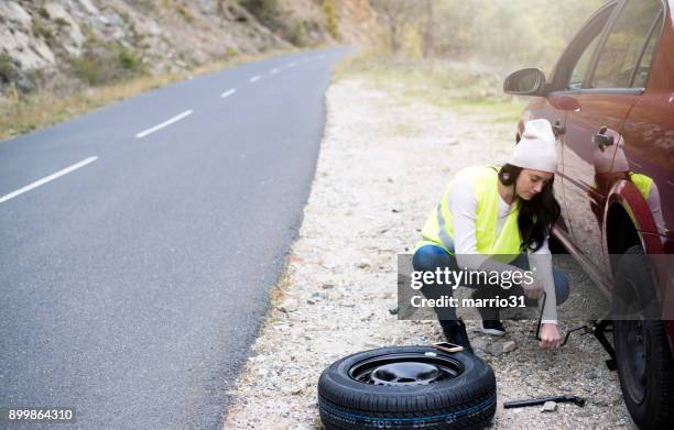 problem with a car - flat tyre stock pictures, royalty-free photos & images