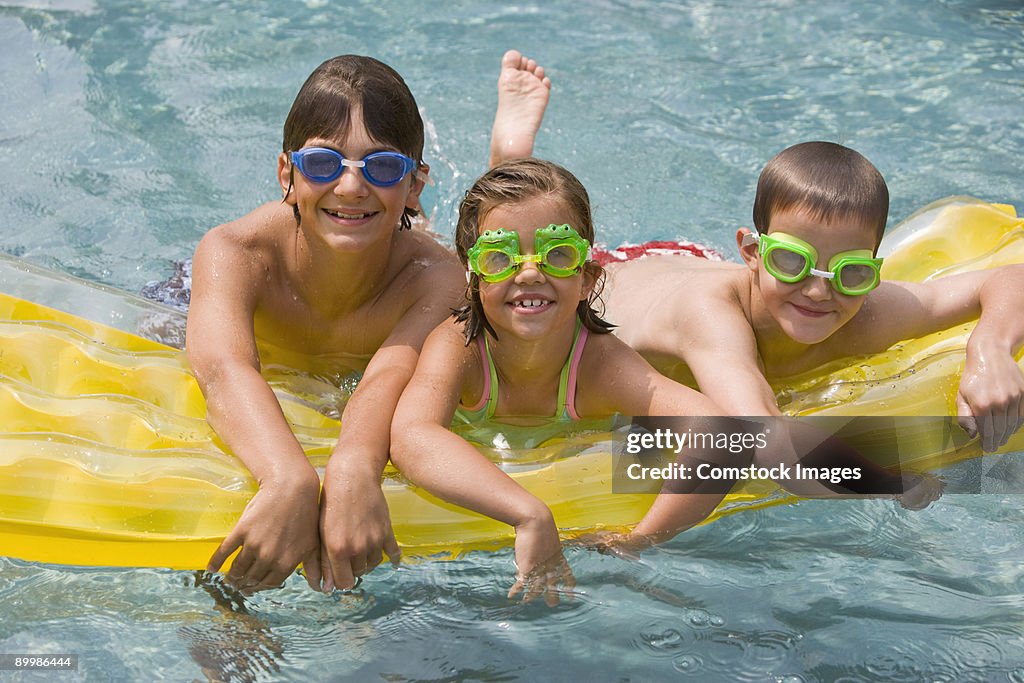 Tween Floating Inpool Kids Floating In Pool High-Res Stock Photo - Getty Images