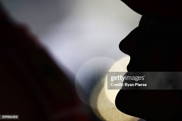 Former Ferrari F1 World Champion Michael Schumacher of Germany watches from the pitwall during practice for the European Formula One Grand Prix at...