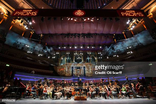 Musicians of The West-Eastern Divan youth orchestra, conducted by Daniel Barenboim rehearse in the Royal Albert Hall ahead of their performace in the...