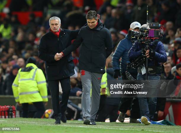 Jose Mourinho, Manager of Manchester United and Mauricio Pellegrino, Manager of Southampton shake hands after the Premier League match between...