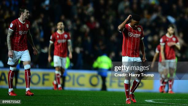 Members of the Bristol City side cut dejected figures as Ryan Bennett of Wolvesscores his sides winning goal during the Sky Bet Championship match...