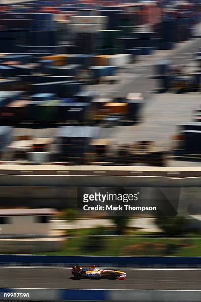Fernando Alonso of Spain and Renault drives during practice for the European Formula One Grand Prix at the Valencia Street Circuit on August 21 in...