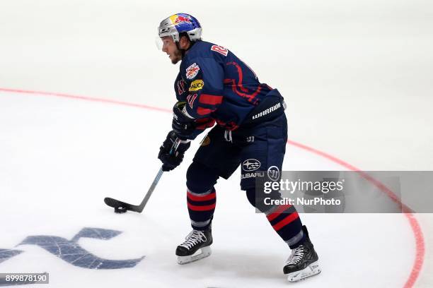 Keith Aucoin of Red Bull Munich during 37th Gameday of German Ice Hockey League match between Red Bull Munich and Thomas Sabo Ice Tigers at...