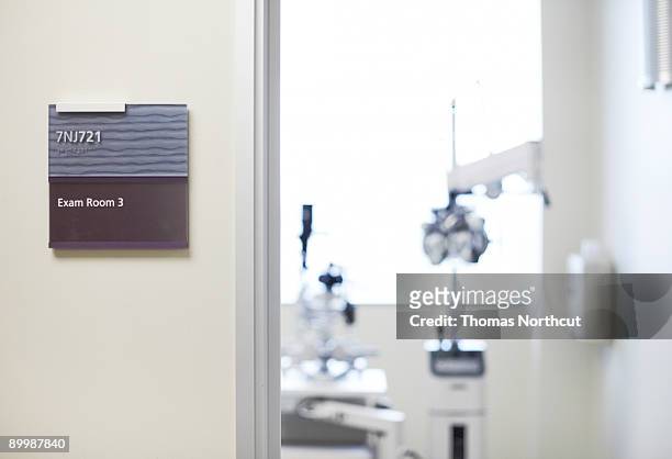 view from hallway into vision exam room  - washington state sign stock pictures, royalty-free photos & images