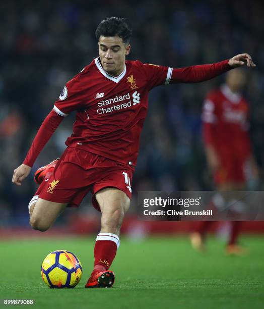 Philippe Coutinho of Liverpool in action during the Premier League match between Liverpool and Leicester City at Anfield on December 30, 2017 in...
