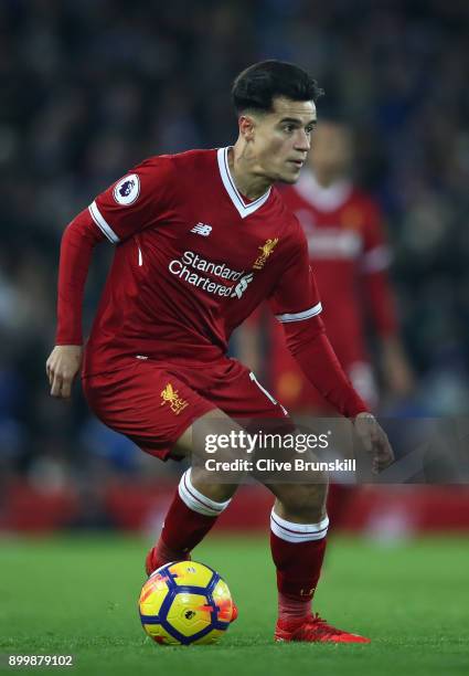 Philippe Coutinho of Liverpool in action during the Premier League match between Liverpool and Leicester City at Anfield on December 30, 2017 in...