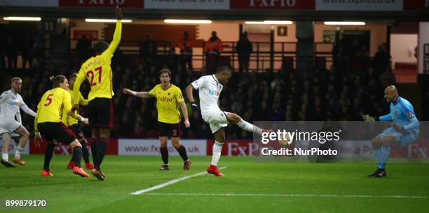 Swansea City's Jordan Ayew scores his sides equalising goal to make the score 1-1 during Premier League match between Watford and Swansea City at...