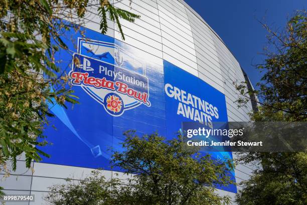 View of a PlayStation Fiesta Bowl sign as it sits on the University of Phoenix Stadium on December 30, 2017 in Glendale, Arizona. The PlayStation...