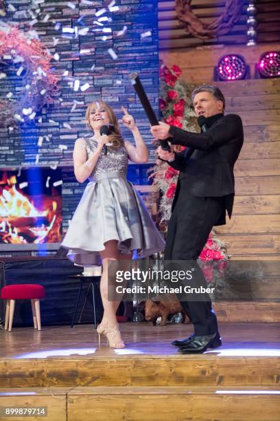 The Hosts Joerg Pilawa and Francine Jordi perform during the New Year's Eve tv show hosted by Joerg Pilawa on December 30, 2017 in Graz, Austria.