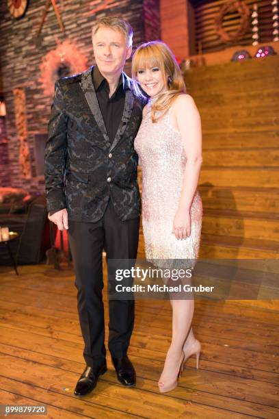 The Hosts Joerg Pilawa and Francine Jordi pose during the New Year's Eve tv show hosted by Joerg Pilawa on December 30, 2017 in Graz, Austria.