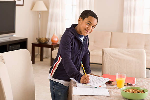 Homework 2000s 9,041 Boys 2000 Stock Photos, High-Res Pictures, and Images - Getty Images