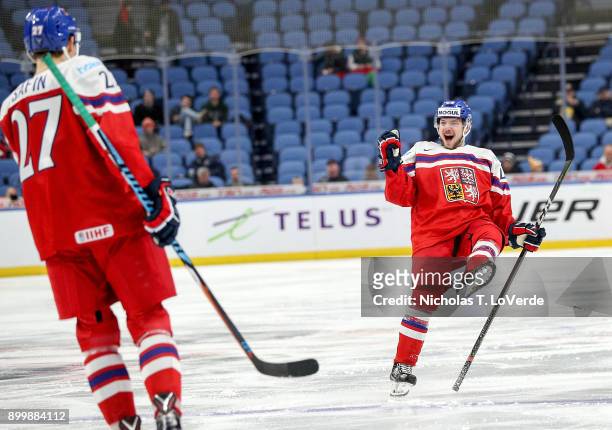 Radovan Pavlík of Czech Republic celebrates the first of his two second period goals with Ostap Safin during the second period of play in the IIHF...