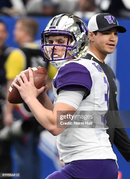Jake Browning of the Washington Huskies prepares for a game against the Penn State Nittany Lions during the Playstation Fiesta Bowl at University of...