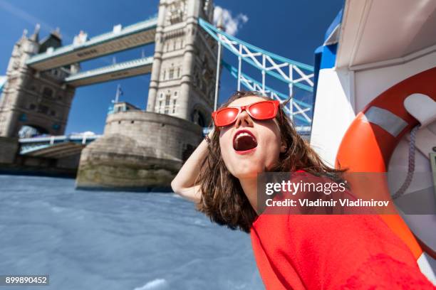 woman having fun - red dress stock pictures, royalty-free photos & images