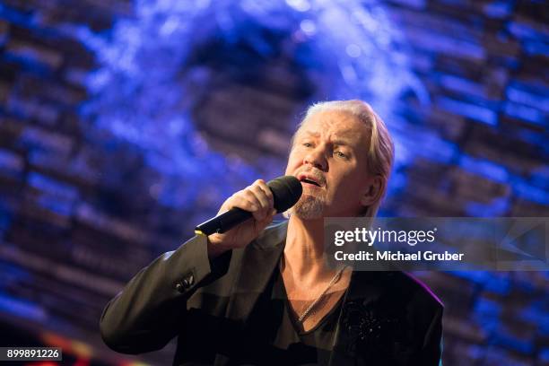 Singer Johnny Logan performs during the New Year's Eve tv show hosted by Joerg Pilawa on December 30, 2017 in Graz, Austria.