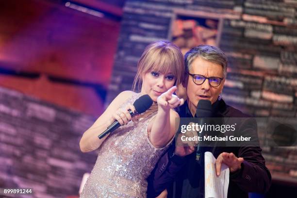 The Hosts Francine Jordi and Joerg Pilawa perform during the New Year's Eve tv show hosted by Joerg Pilawa on December 30, 2017 in Graz, Austria.