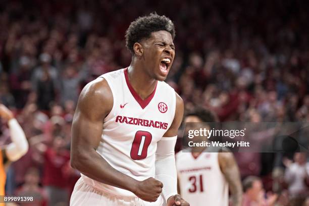 Jaylen Barford of the Arkansas Razorbacks screams after making a shot during a game against the Tennessee Volunteers at Bud Walton Arena on December...