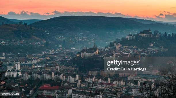 panorama at dusk of old town sighisoara, transylvania, romania - sighisoara stock pictures, royalty-free photos & images