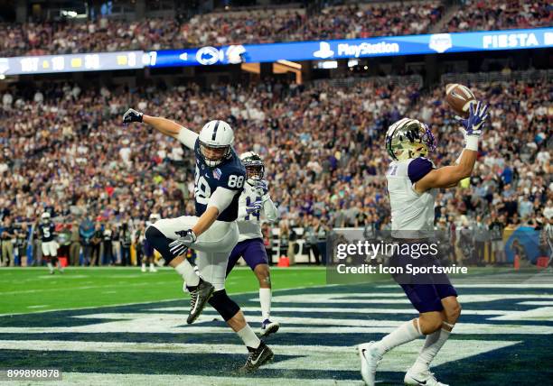 Washington Huskies defensive back Byron Murphy snatches an first quarter interception in the end zone during the PlayStation Fiesta Bowl college...