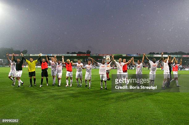The team of Berlin celebrates after winning the Second Bundesliga match between 1. FC Union Berlin and Hansa Rostock at the stadium An der Alten...