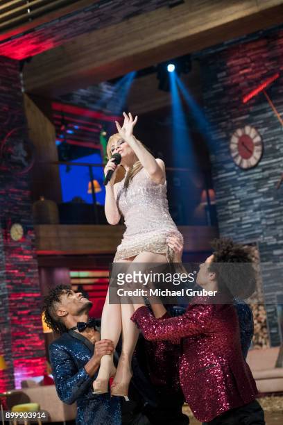 Host Francine Jordi performs during the New Year's Eve tv show hosted by Joerg Pilawa on December 30, 2017 in Graz, Austria.