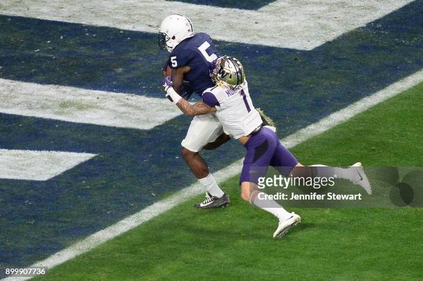 Wide receiver DaeSean Hamilton of the Penn State Nittany Lions runs in a 48 yard touchdown against defensive back Byron Murphy of the Washington...