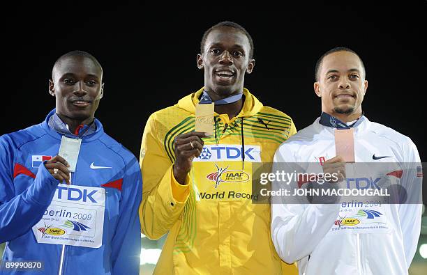 Jamaica's Usain Bolt celebrates celebrates during the medal ceremony of the men's 200m race of the of the 2009 IAAF Athletics World Championships on...