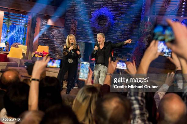 Singer Bonnie Tyler and Singer Johnny Logan performs together during the New Year's Eve tv show hosted by Joerg Pilawa on December 30, 2017 in Graz,...