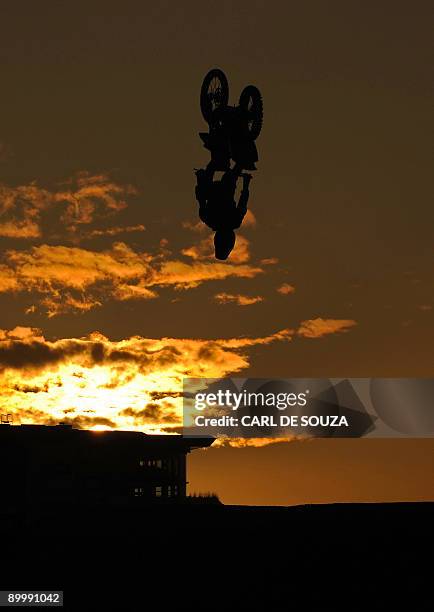 Freestyle Motorcross rider is pictured in action at Battersea Power Station, in London on August 21, 2009. The rider was training ahead of the Red...