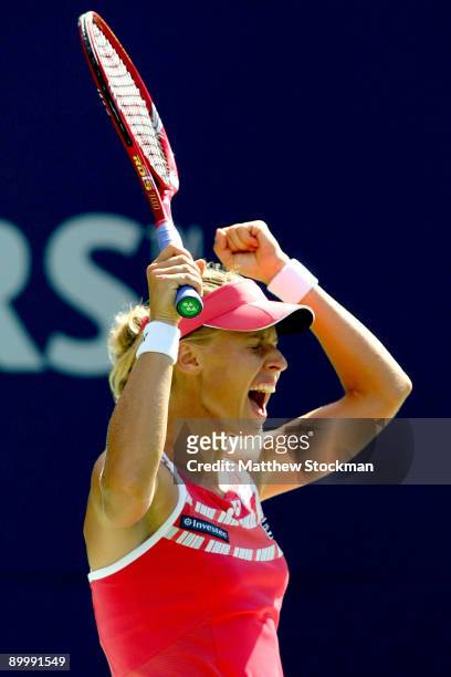 Elena Dementieva of Russia celebrates match point against Samantha Stosur of Australia during the Rogers Cup at the Rexall Center on August 21, 2009...