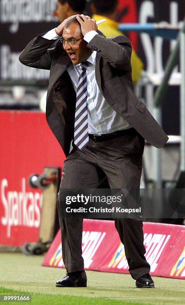 Head coach Felix Magath of Schalke looks angry during the Bundesliga match between 1899 Hoffenheim and FC Schalke 04 at Rhein-Neckar Arena on August...