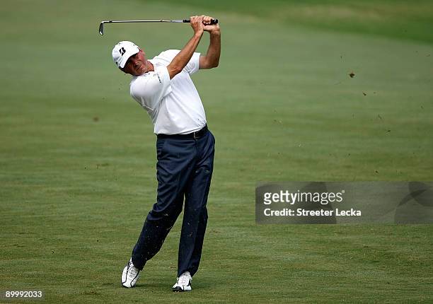 Fred Couples hits a shot from the fairway on the 1st hole during the second round of the Wyndham Championship at Sedgefield Country Club on August...