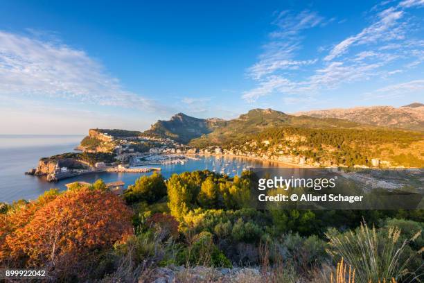 high angle view on port de soller mallorca at sunset - lighthouse mallorca stock pictures, royalty-free photos & images