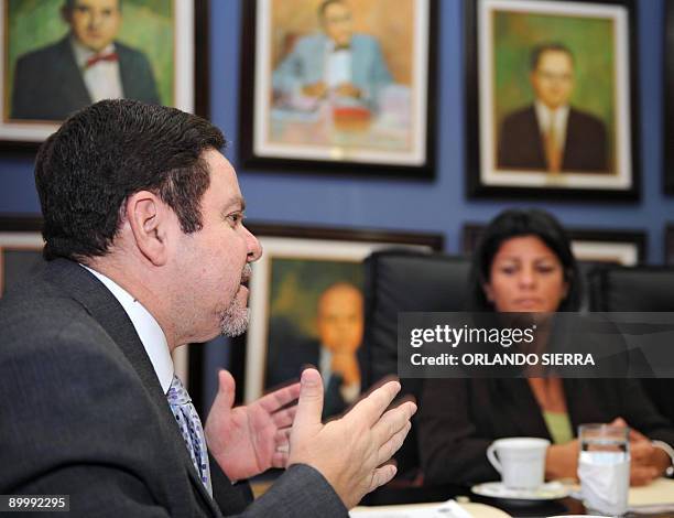 Honduran Supreme Court president Jorge Rivera speaks during a meeting with the president of the Inter-American Commission on Human Rights , Patricia...