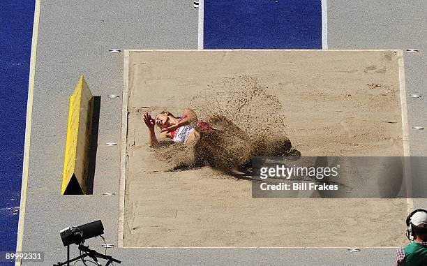12th IAAF World Championships: Russia Tatyana Chernova in action, landing in pit during Women's Heptathlon Long Jump at Olympiastadion. Berlin,...