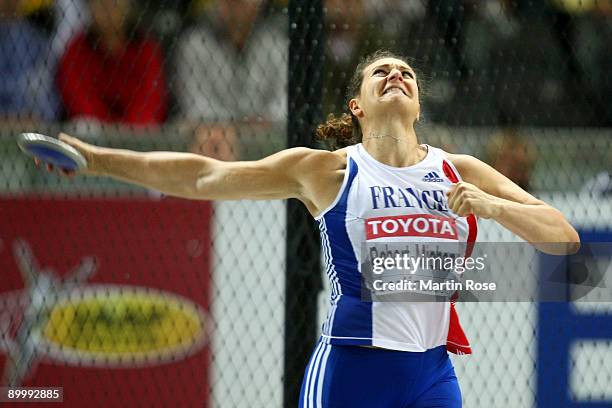 Mélina Robert-Michon of France competes in the women's Discus Throw Final during day seven of the 12th IAAF World Athletics Championships at the...