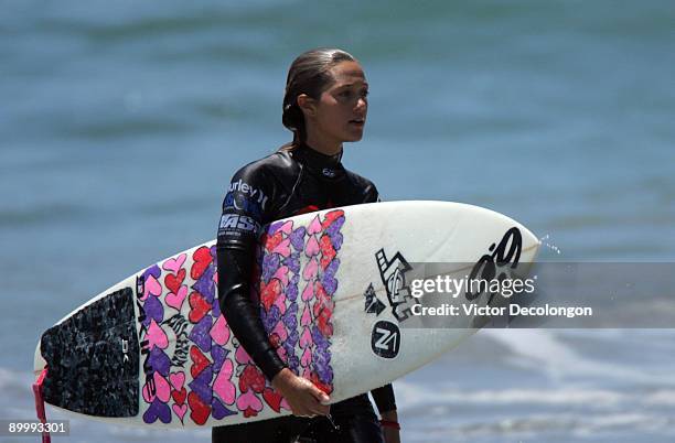 Monyca Byrne-Wickey walks back to the competitor's area after placing second in Heat 1 of the Round of 24 of the Nike 6.0 Pro Junior Women's Grade 4...