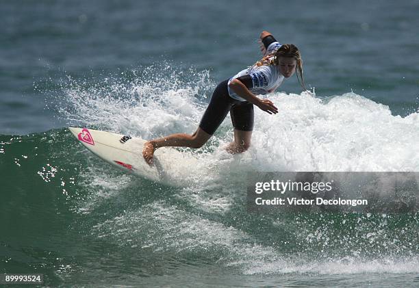 Franscisca Santos surfs in Heat 2 of the Round of 24 of the Nike 6.0 Pro Junior Women's Grade 4 event as part of the 2009 Hurley U.S. Open of Surfing...