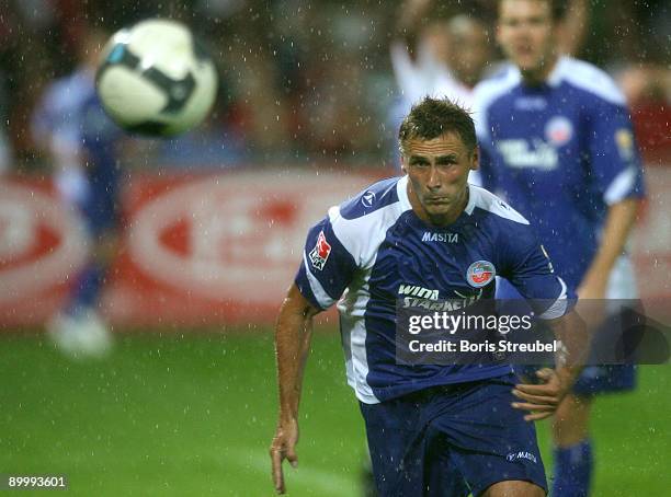 Marcel Schied of Rostock runs with the ball during the Second Bundesliga match between 1. FC Union Berlin and Hansa Rostock at the stadium An der...