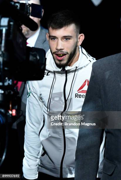 Matheus Nicolau of Brazil prepares to enter the Octagon prior to his flyweight bout against Louis Smolka during the UFC 219 event inside T-Mobile...