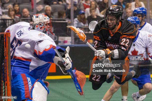 Buffalo Bandits Josh Byrne gets airborne but misses the net as Rock goalie Nick Rose covers the far side. Toronto Rock vs Buffalo Bandits in 1st half...