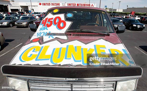 Painted Dodge Ram Van advertises the federal "Cash for Clunkers" program at United Suzuki Mitsubishi August 21, 2009 in Las Vegas, Nevada. The Obama...