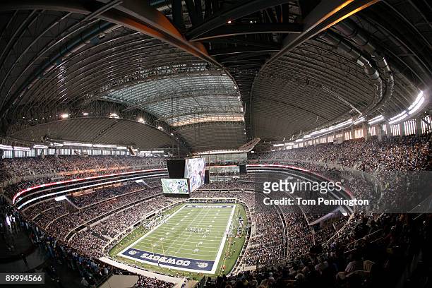 The Dallas Cowboys take on the Tennessee Titans in the second quarter during a preseason game at Cowboys Stadium on August 21, 2009 in Arlington,...