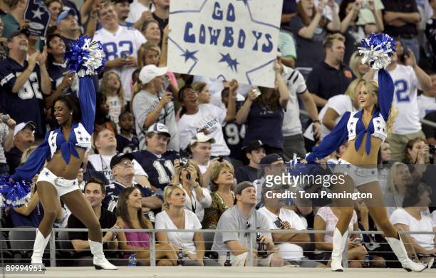 Dallas Cowboys Cheerleaders perform for the fans before the Cowboys take the field against the Tennessee Titans during a preseason game at Cowboys...