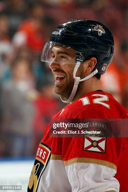 Ian McCoshen of the Florida Panthers has a laugh while warming up against the Philadelphia Flyers at the BB&T Center on December 28, 2017 in Sunrise,...