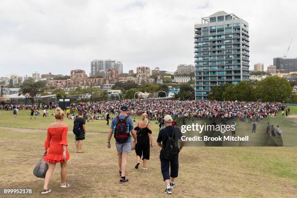 Huge crowd waits at the Domain to enter the viewing area at Mrs Macquarie's Chair on New Year's Eve on December 31, 2017 in Sydney, Australia. 1.6...